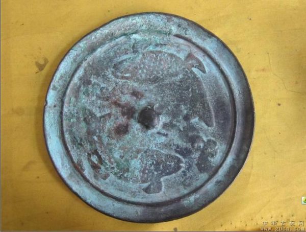 辽金双鱼镜价格_辽金双鱼镜真假辨别