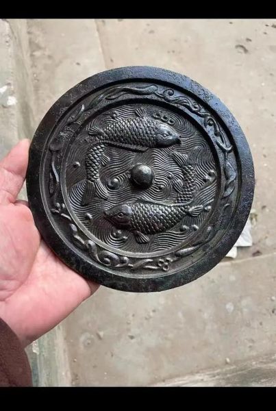 宋代双鱼镜多少钱_宋代双鱼镜真假鉴定